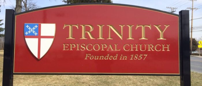 Red sign for Trinity Episcopal Church.